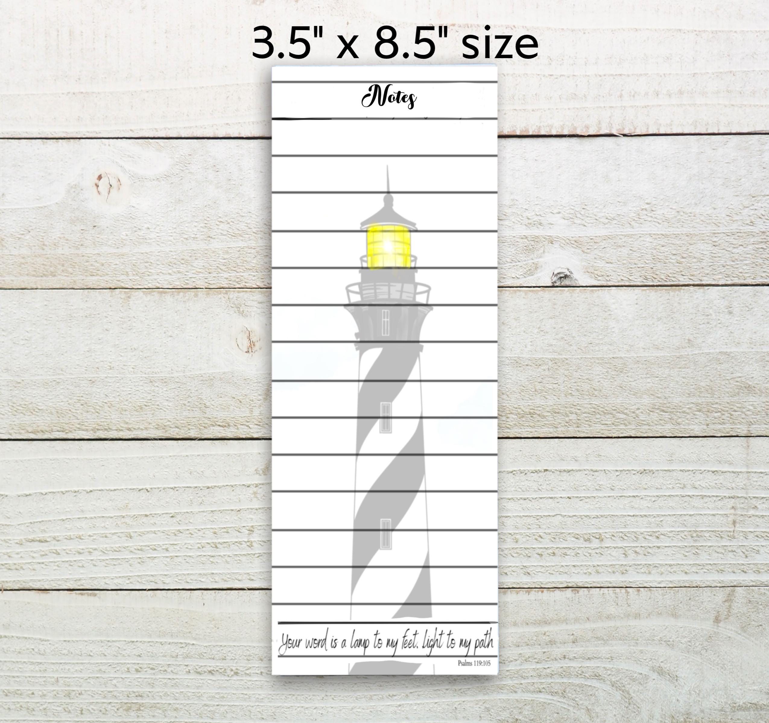 A 3.5&quot; x 8.5&quot; size notepad with a lighthouse illustration on it.