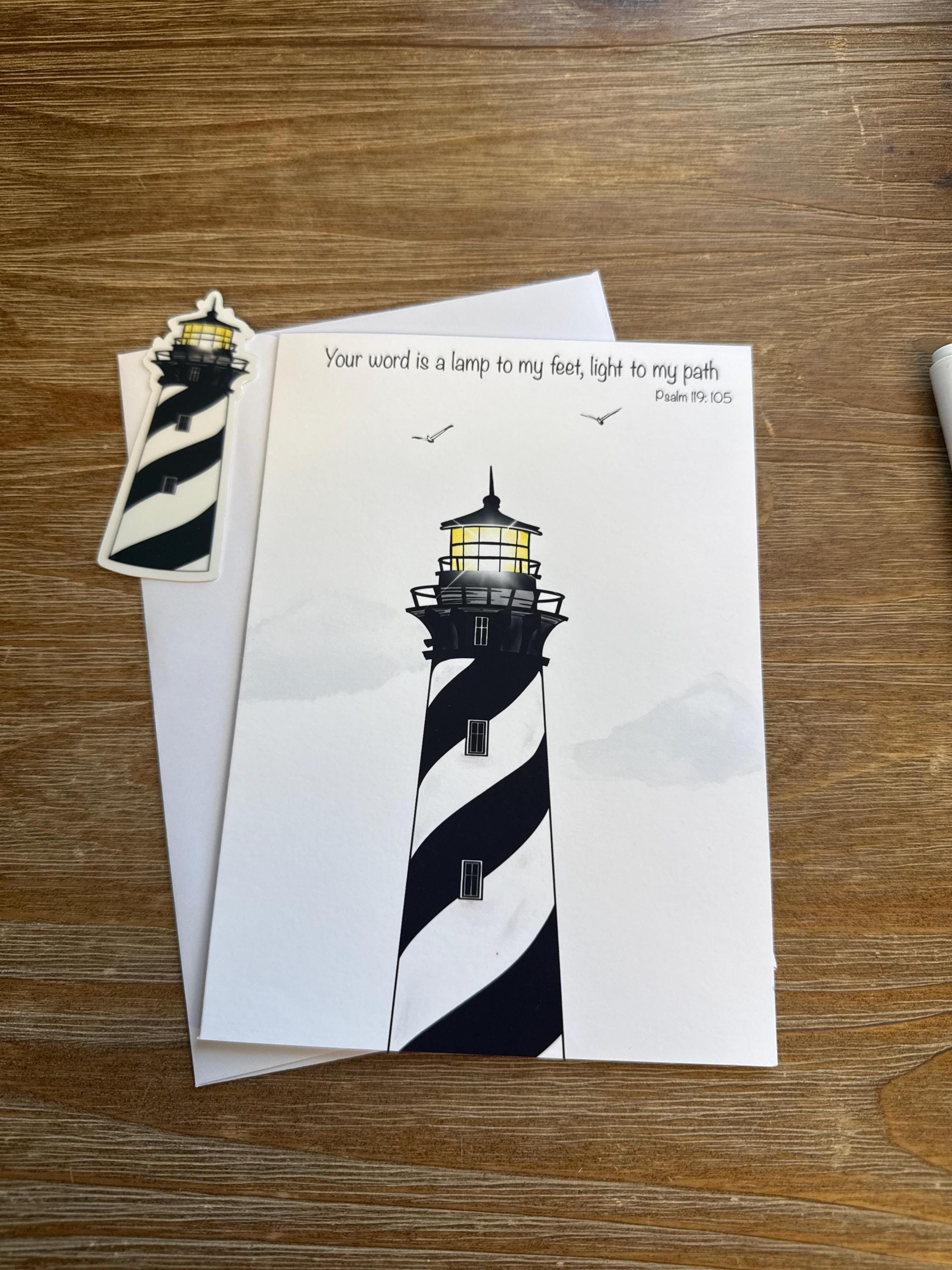 a lighthouse with a black and white striped pattern, and there is a small sticker of a lighthouse on the left side of the image.