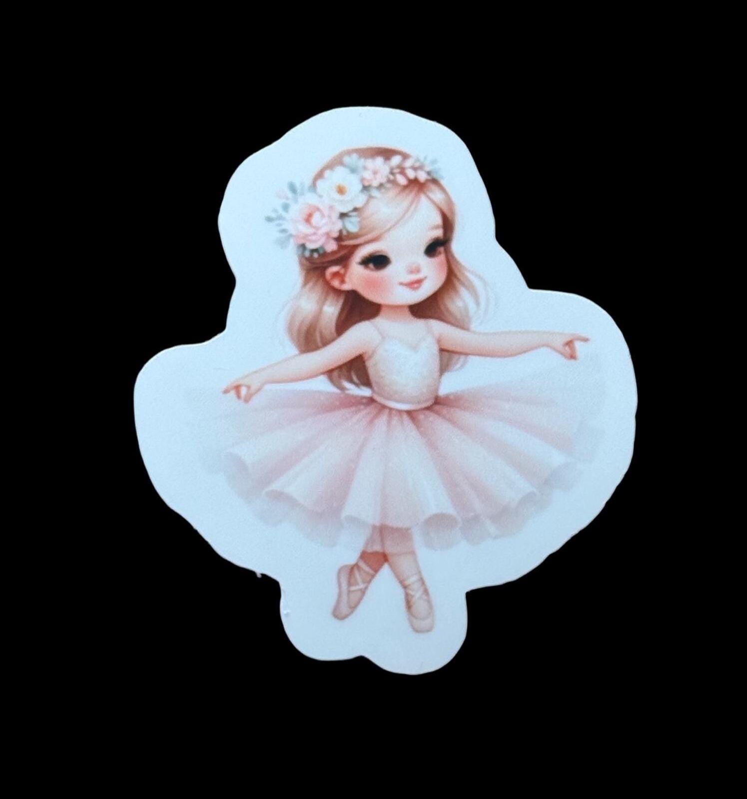 A sticker depicting a young girl in a tutu and flower crown, with her arms outstretched.